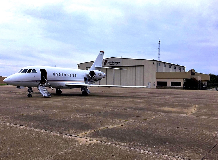 A plane in front of the ProEnergy aircraft hangar